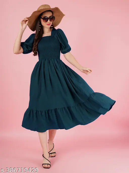 Elevated Elegance Redefining Style with the Smocked A-line Midi Dress